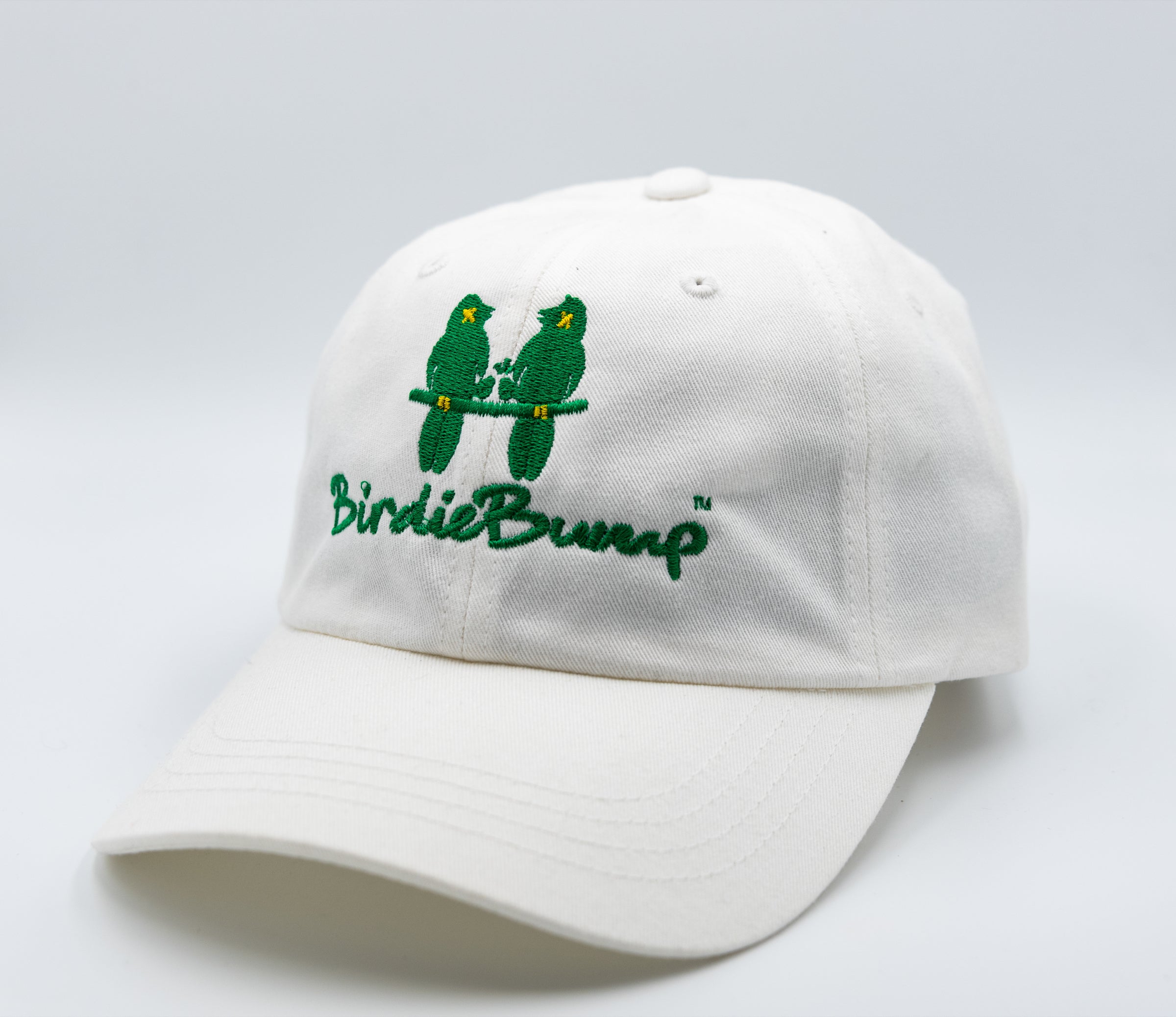 Birdie Bump White on White Dad Hat Master Green Logo