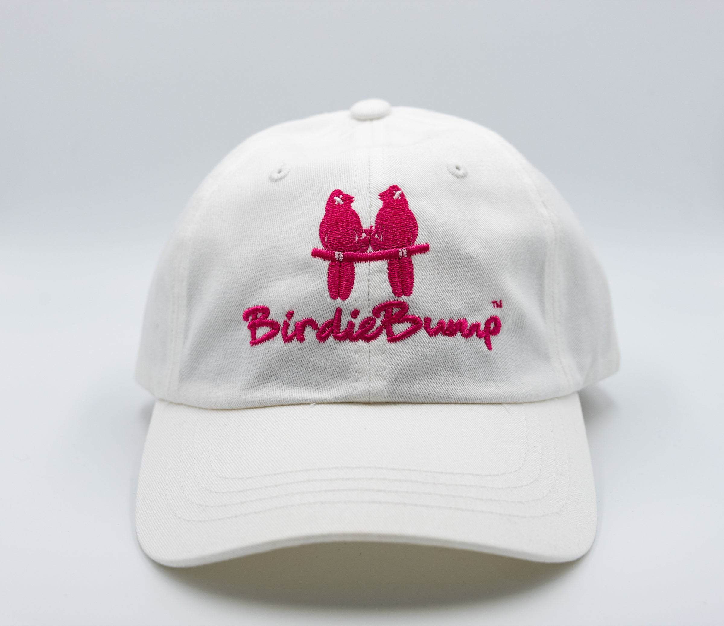 Birdie Bump White on White Dad Hat Pink Logo